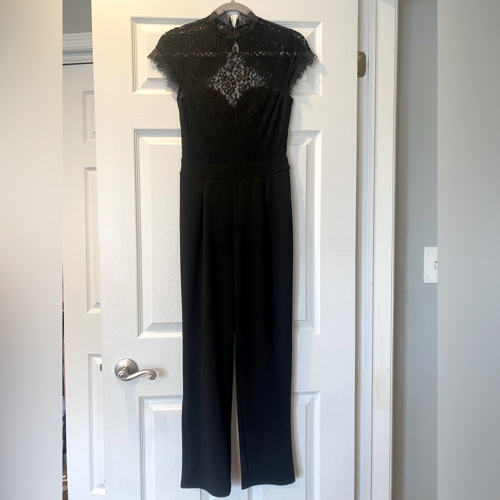 EXPRESS. Black lace jumper body suit. Chic. Classy. Comfortable. Size S.